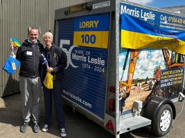 President Bev and Graeme with the 100th truck 